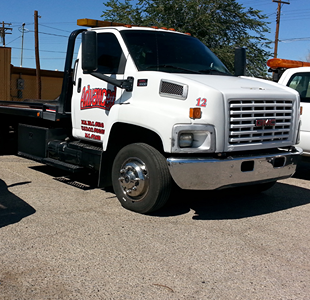 Grúa Avanzada de Remolque y Remolque de Vehículos | Advanced Towing & Repossession LLC